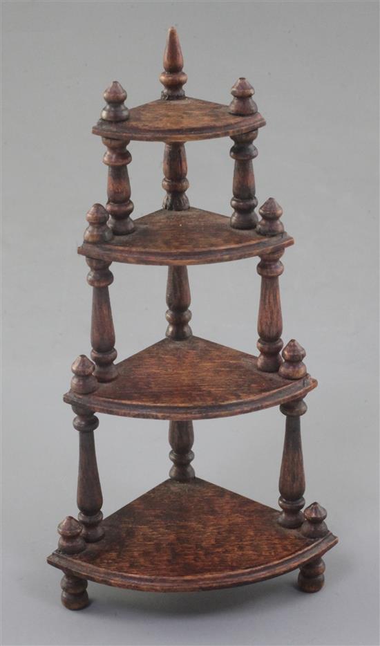 Denis Hillman. A Victorian stained beech four tier miniature bowfronted corner whatnot, height 5in.